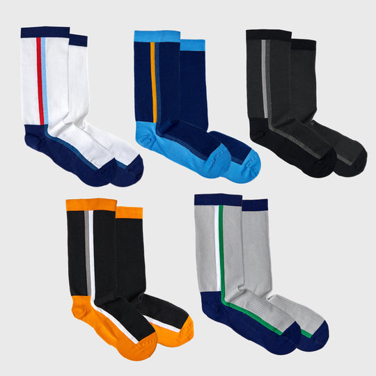 Five pairs of crew socks in different color combinations, each with a distinct stripe design, arranged in two rows on a light background.